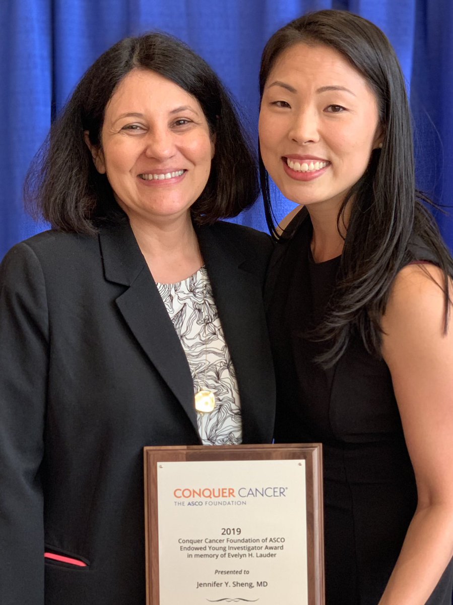 Jennifer Sheng holds her Conquer Cancer-BCRF award and poses with her mentor, Dr. Vered Stearns