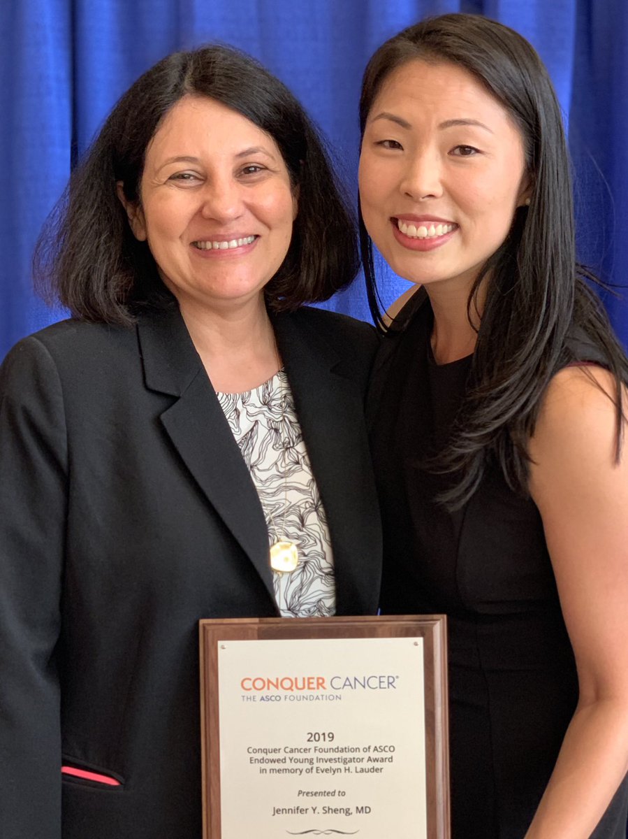 Jennifer Sheng holds her Conquer Cancer-BCRF award and poses with her mentor, Dr. Vered Stearns