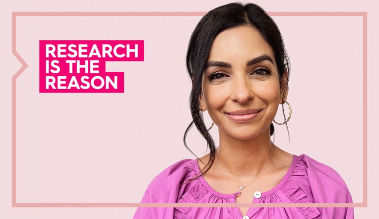 Nasreen wears a pink top and smiles at the camera with the words research is the reason next to her