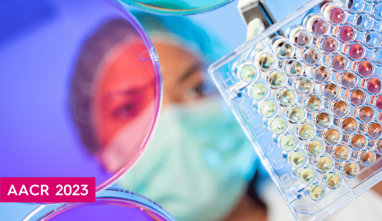 a stock photo of a researcher using a pipette tool with the words AACR 2023 in a pink box