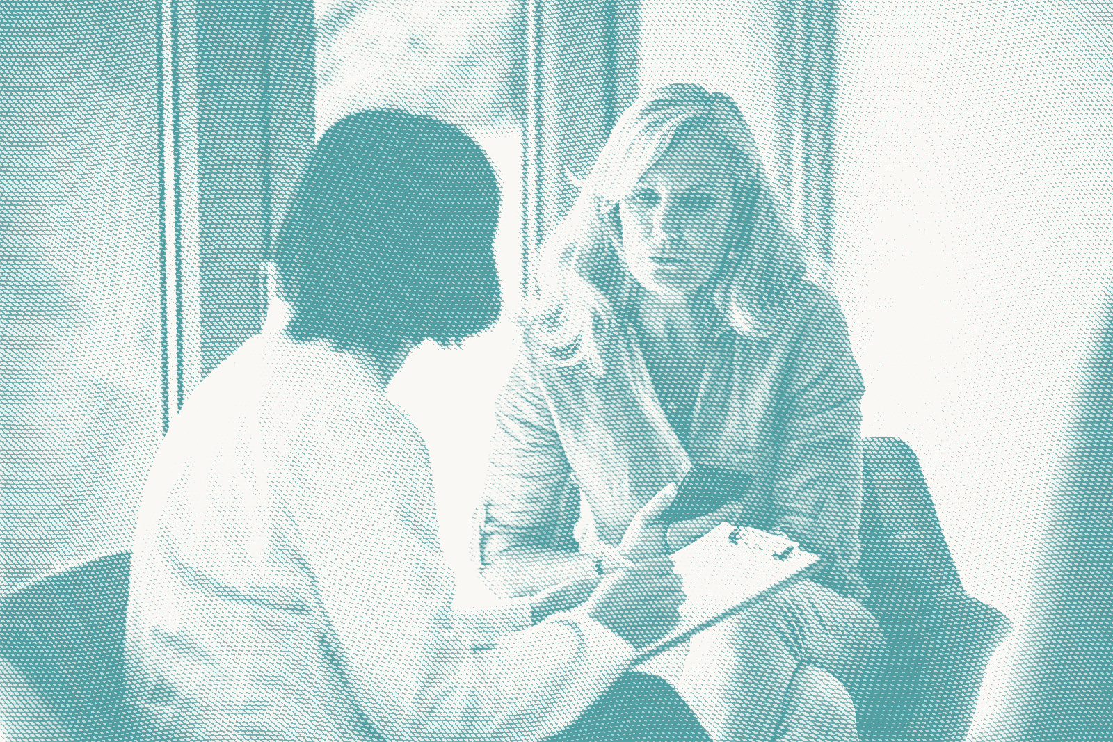 a woman consults with a doctor about targeted therapy for breast cancer