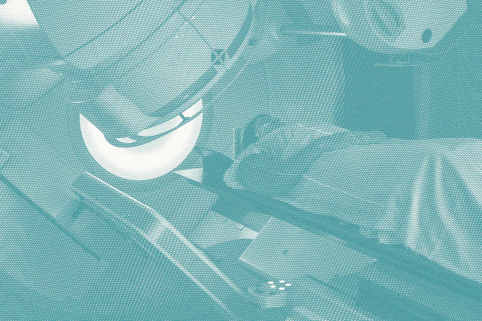 a woman gets radiation for breast cancer; she lies down with the machine overhead