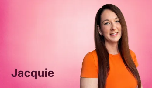 Jacquie Matthews smiling at the camera in front of a pink background and her name