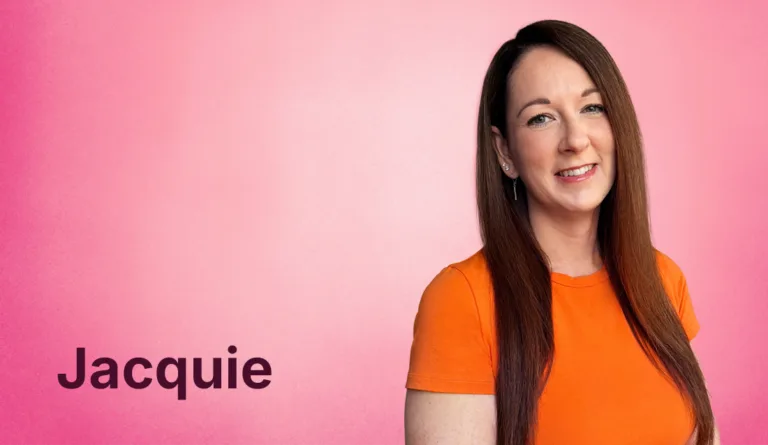 Jacquie Matthews smiling at the camera in front of a pink background and her name