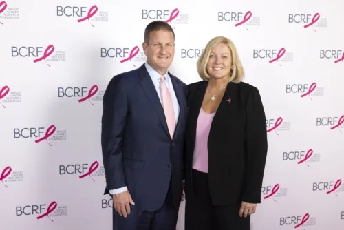 karen and rob hale standing in front of BCRF signage
